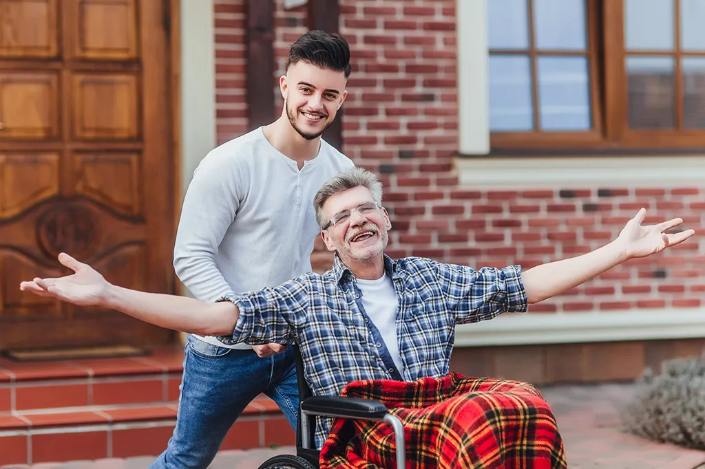 senior-father-wheelchair-young-son-walk.jpg